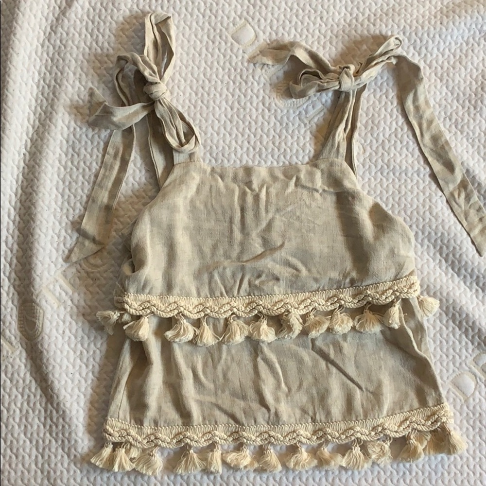 Fringe tank with adjustable straps